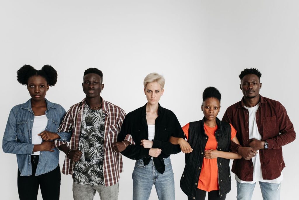 Group of people standing together in unity